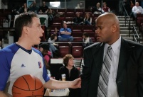 NBA development league referee Michael Weiland, left, confers with Randy Livingston, coach of the Idaho Stampede, in league play last November. (Photo courtesy of NBA head office)
